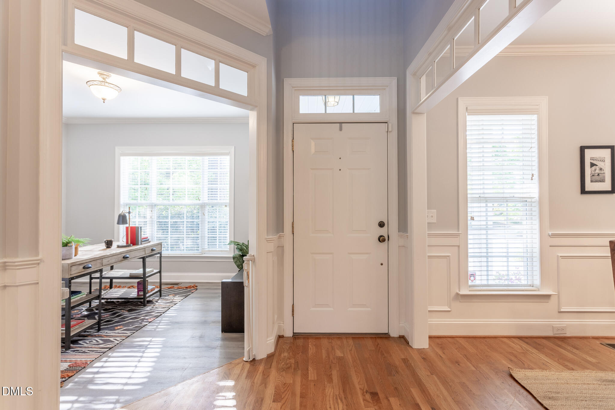 10 Highgrove Lane Durham, NC 27713 - Photo 3 of 41 a view of a livingroom with wooden floor and a window