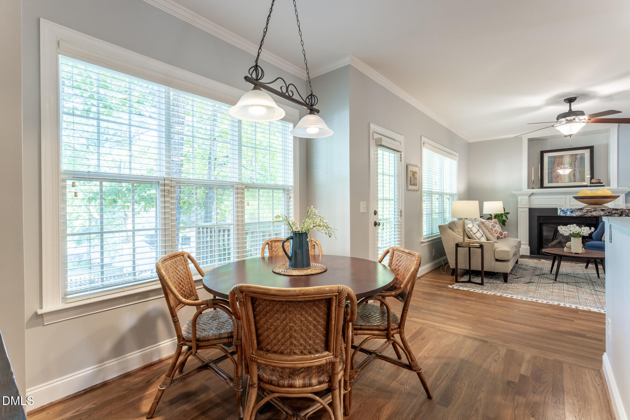 10 Highgrove Lane Durham, NC 27713 - Photo 7 of 41 a dining room with furniture a chandelier and wooden floor