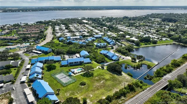a view of swimming pool with a lounge chair