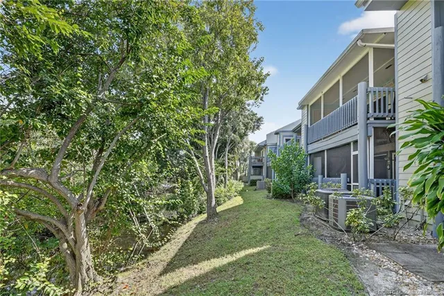 a view of backyard of a house