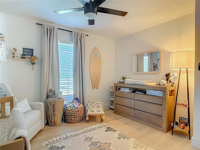 a room with furniture and a window