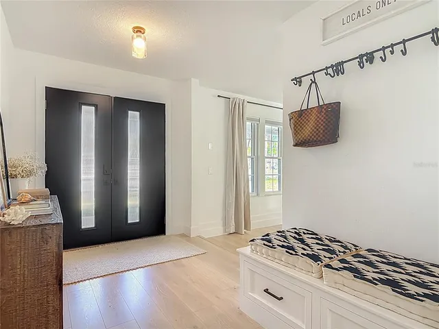 a kitchen with a stove and a refrigerator