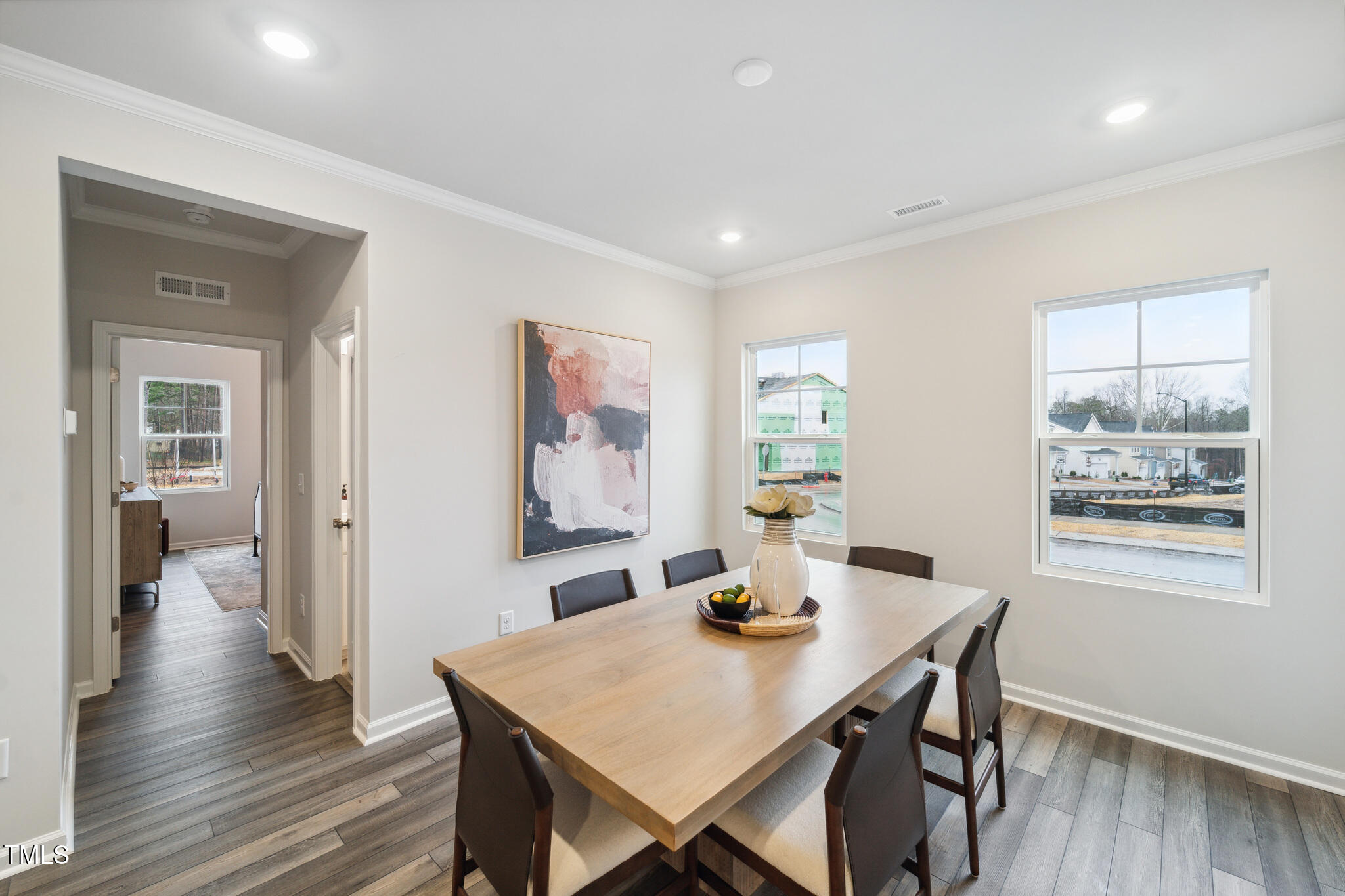 720 Maple Br Circle Graham, NC 27253 - Photo 14 of 40 a view of a dining room with furniture and wooden floor