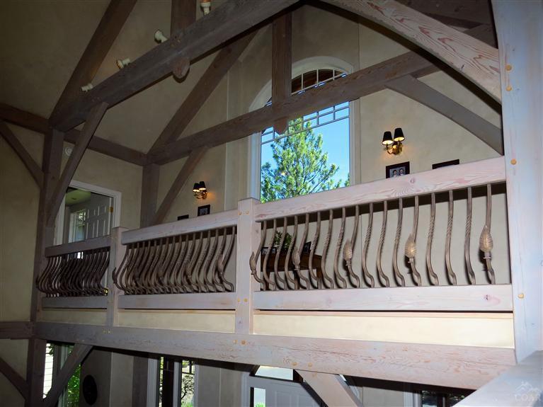 16135 Fox Ridge Circle Sisters, OR 97759 - Photo 8 of 24 Upper level walk way with custom Iron Wo