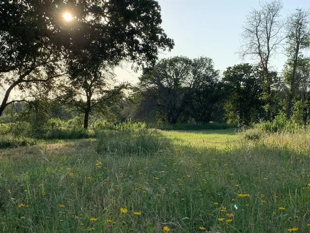a view of outdoor space with a lake view