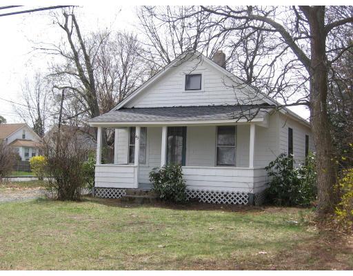 45 Hope Street Springfield, MA 01119 - Photo 1 of 10 a front view of a house with a garden