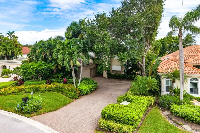 a view of a garden with a fountain