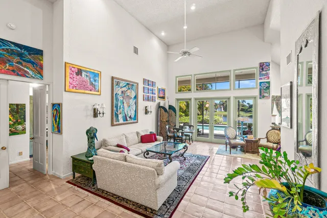 a kitchen with granite countertop stainless steel appliances a refrigerator and cabinets