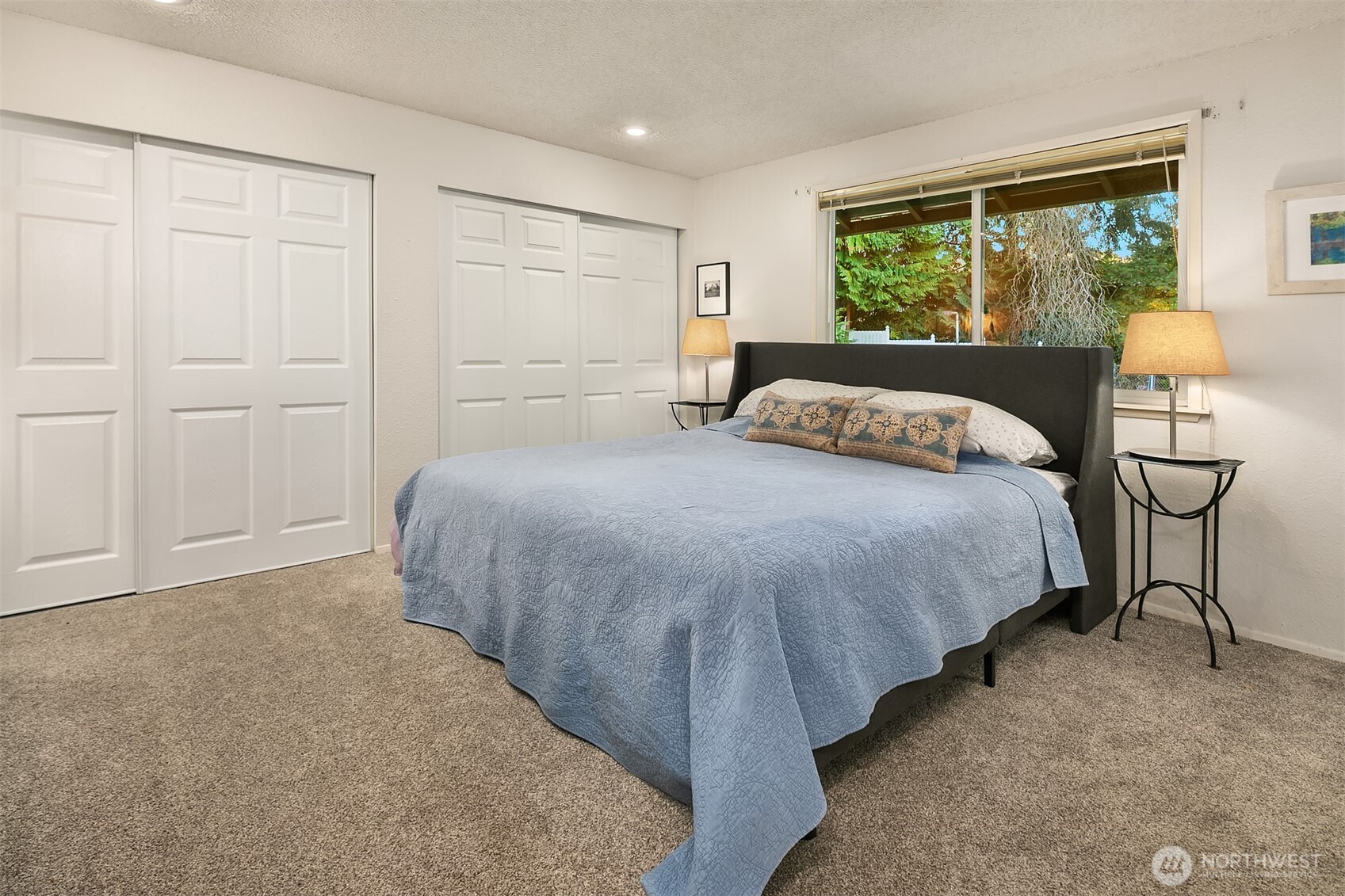 11813 79th Avenue South Seattle, WA 98178 - Photo 11 of 27 a bedroom with a bed and a lamp