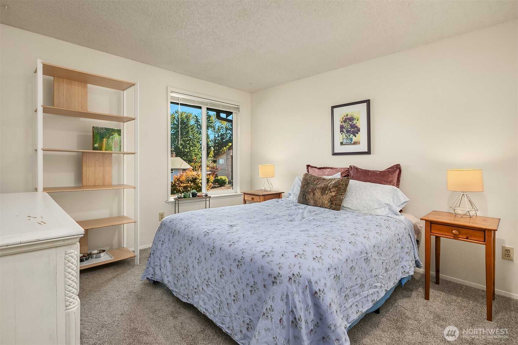 11813 79th Avenue South Seattle, WA 98178 - Photo 14 of 27 a bedroom with a bed and wooden floor
