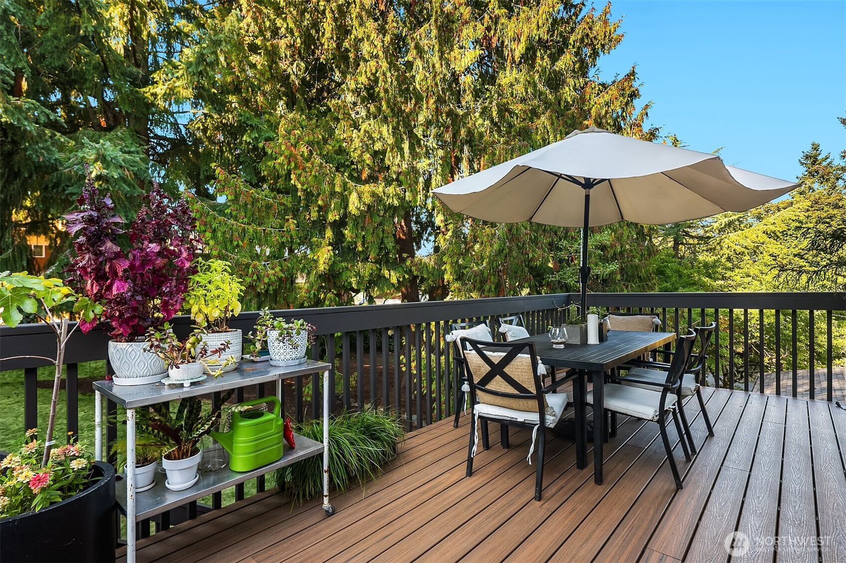 11813 79th Avenue South Seattle, WA 98178 - Photo 19 of 27 a view of balcony with outdoor seating and wooden floor