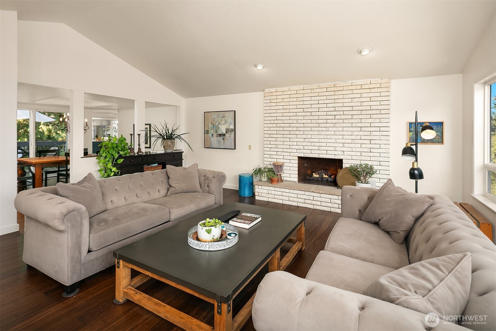11813 79th Avenue South Seattle, WA 98178 - Photo 5 of 27 a living room with furniture fireplace and a table