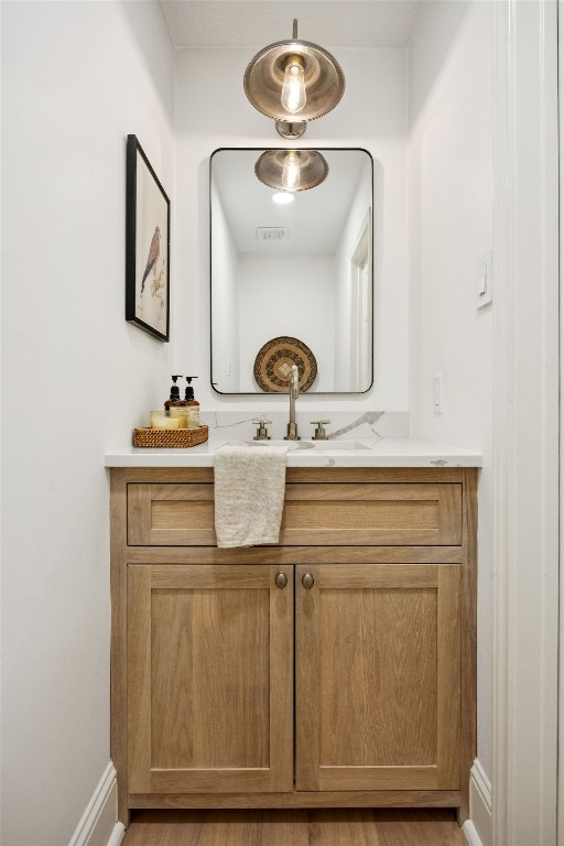 2 North Thundercreek Place Spring, TX 77381 - Photo 19 of 47 The powder bathroom is well-appointed and conveniently located.