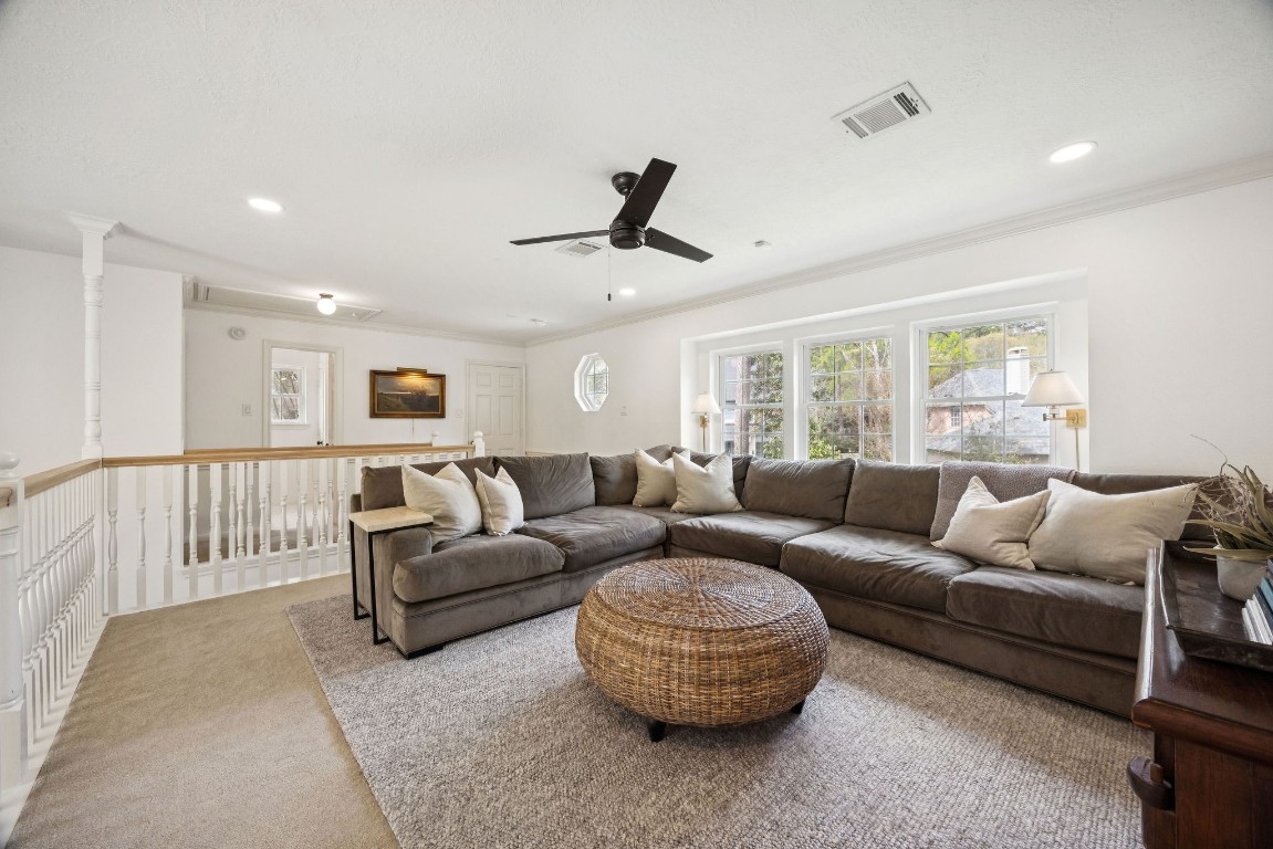 2 North Thundercreek Place Spring, TX 77381 - Photo 25 of 47 Upstairs, a sizable game room loft creates the perfect space for movie nights, games, or a window reading nook with beautiful lighting.