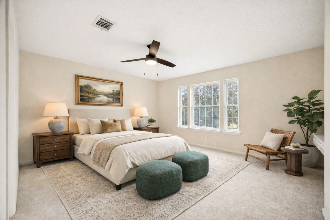 2 North Thundercreek Place Spring, TX 77381 - Photo 28 of 47 Bedroom #3 upstairs is sizable with large windows and a charming built-in nook.