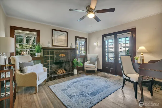a living room with furniture and a fireplace