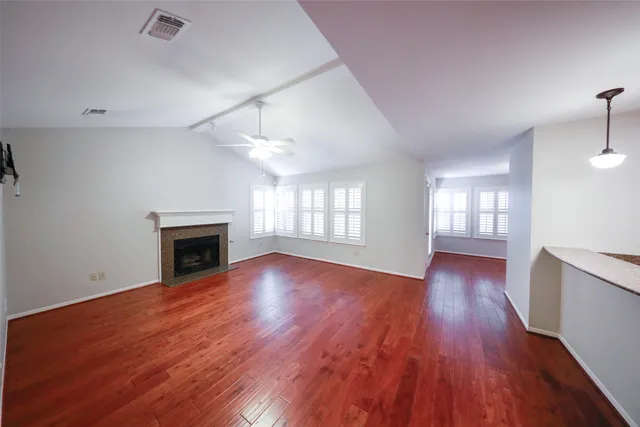 a view of a house with backyard from a patio