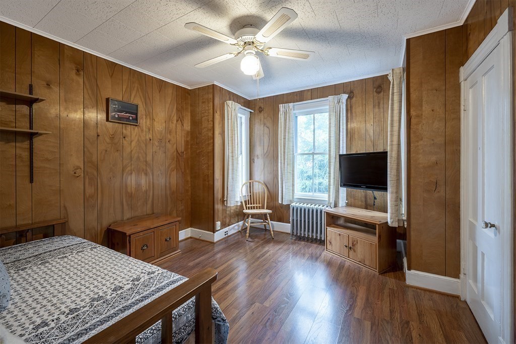 23 Salem Road Billerica, MA 01862 - Photo 12 of 42 a view of a livingroom with furniture and a flat screen tv
