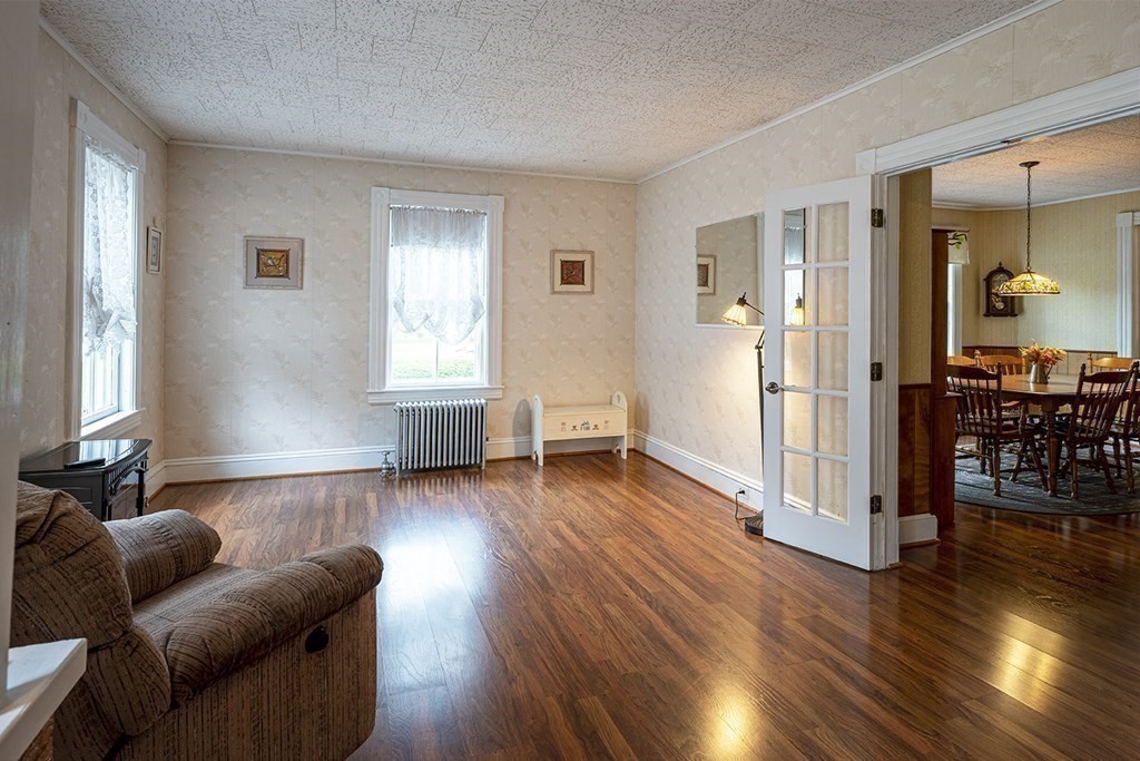 23 Salem Road Billerica, MA 01862 - Photo 13 of 42 a living room with furniture and wooden floor