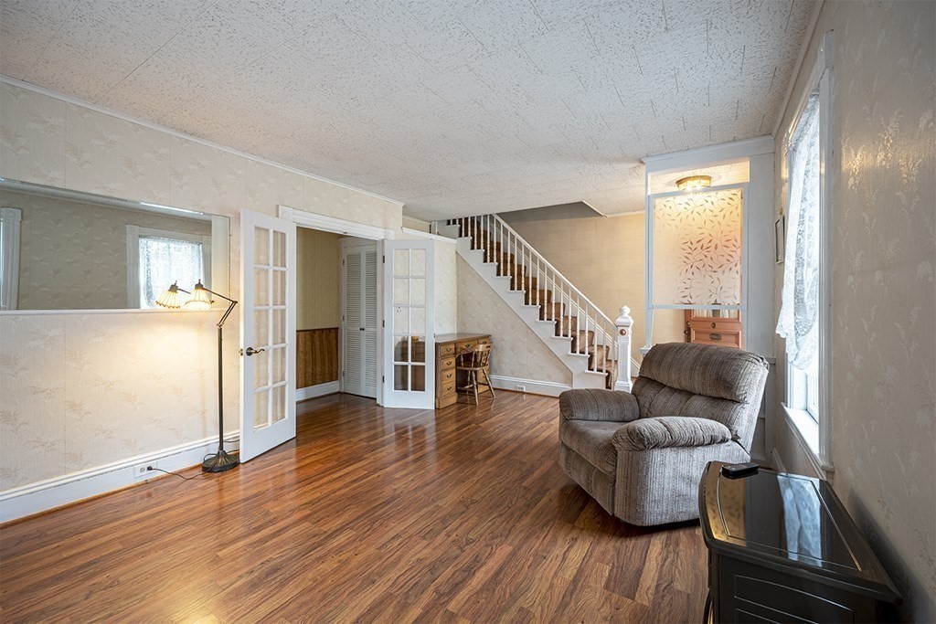 23 Salem Road Billerica, MA 01862 - Photo 14 of 42 a living room with furniture and a wooden floor