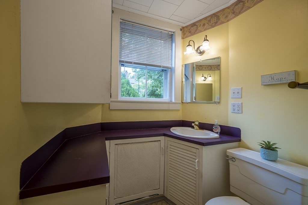 23 Salem Road Billerica, MA 01862 - Photo 27 of 42 a bathroom with a sink and a toilet