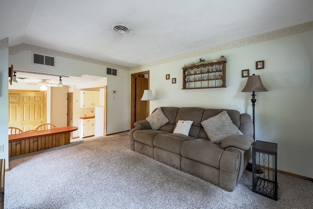 23 Salem Road Billerica, MA 01862 - Photo 29 of 42 a living room with furniture and a large window
