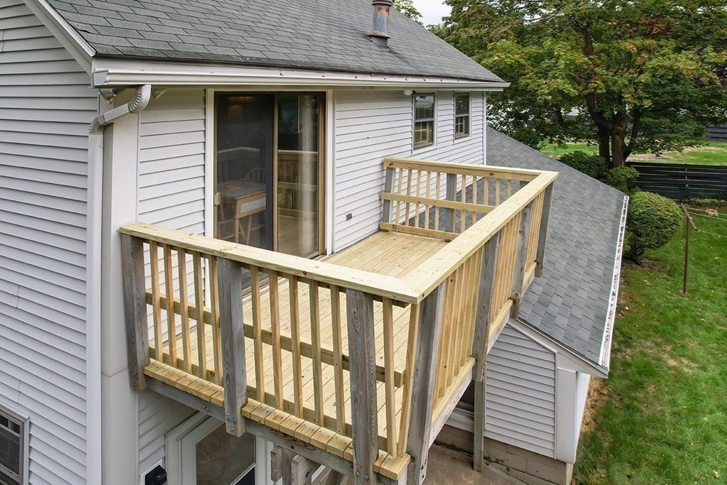 23 Salem Road Billerica, MA 01862 - Photo 38 of 42 a view of a house with backyard and deck