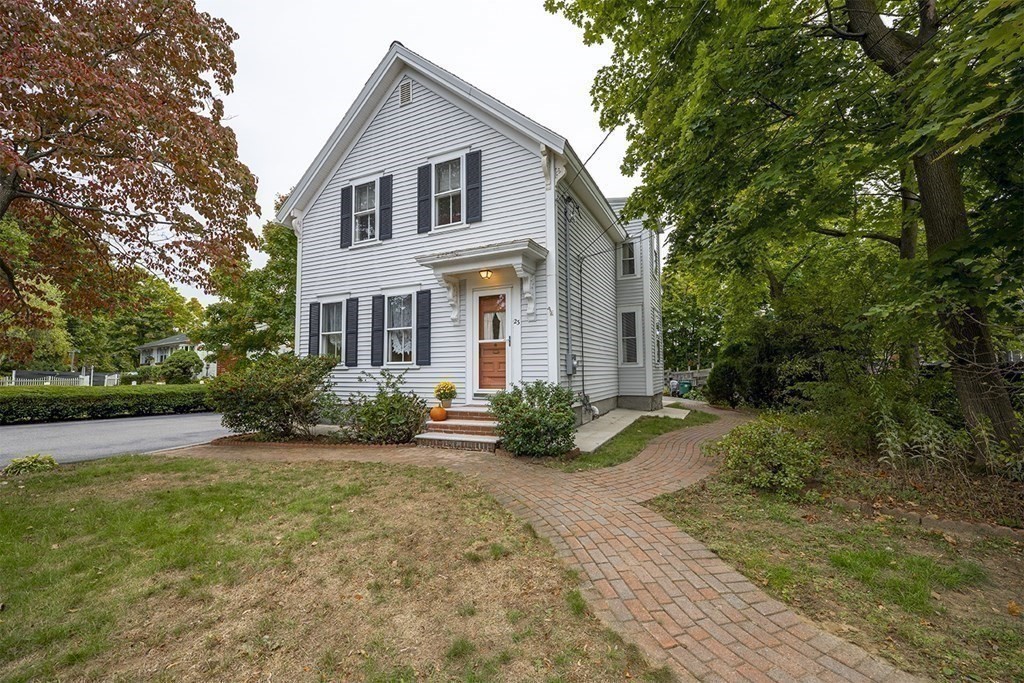 23 Salem Road Billerica, MA 01862 - Photo 4 of 42 a front view of a house with garden