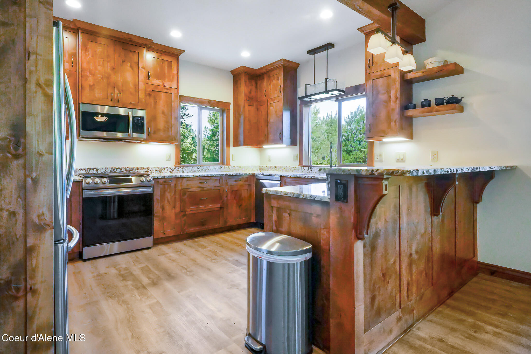 273 Paradise Valley Road Bonners Ferry, ID 83805 - Photo 3 of 37 Custom Alder cabinetry thought the home