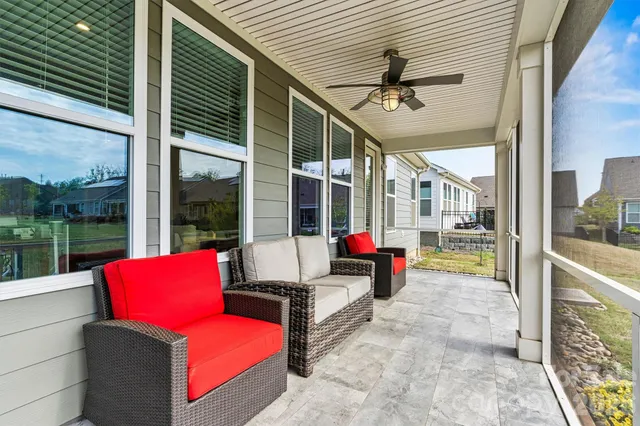 a view of a couches with wooden floor
