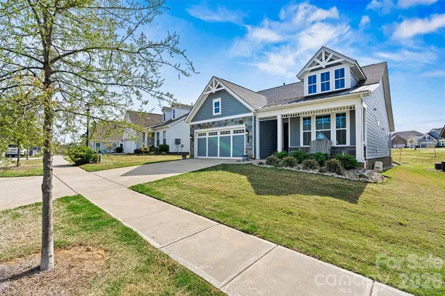 a front view of a house with swimming pool