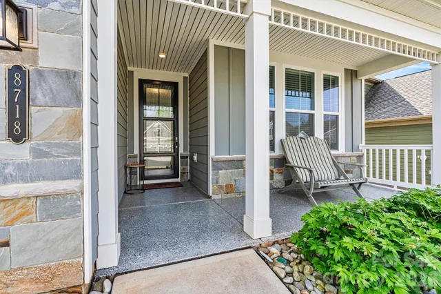 a view of a house with a porch