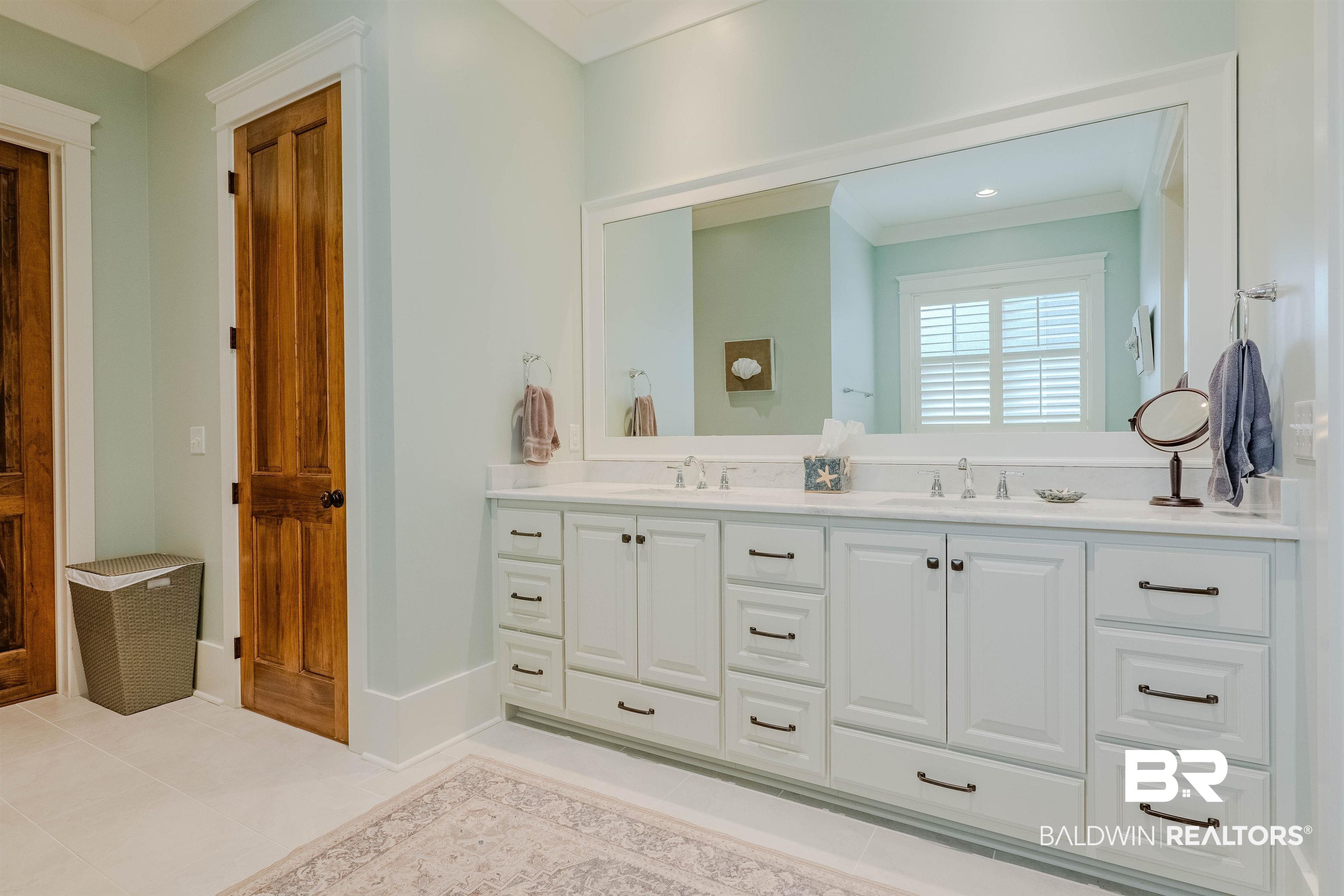 708 Manning Place Fairhope, AL 36532 - Photo 26 of 58 Bathroom with tile patterned flooring, vanity, and crown molding