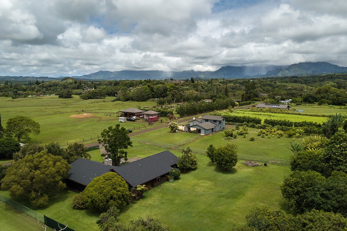6164 Holio Road Kapaa, HI 96746 - Photo 2 of 8 a view of a lake with a houses