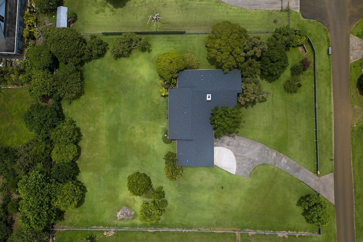 6164 Holio Road Kapaa, HI 96746 - Photo 3 of 8 an aerial view of a residential houses with outdoor space