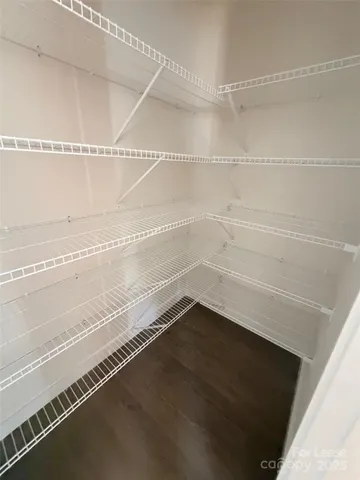 a view of a room with an empty space