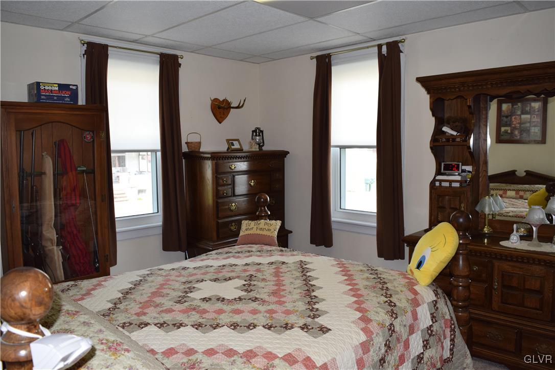 4395 Little Gap Road Kunkletown, PA 18058 - Photo 38 of 41 a bedroom with a bed and wooden floor