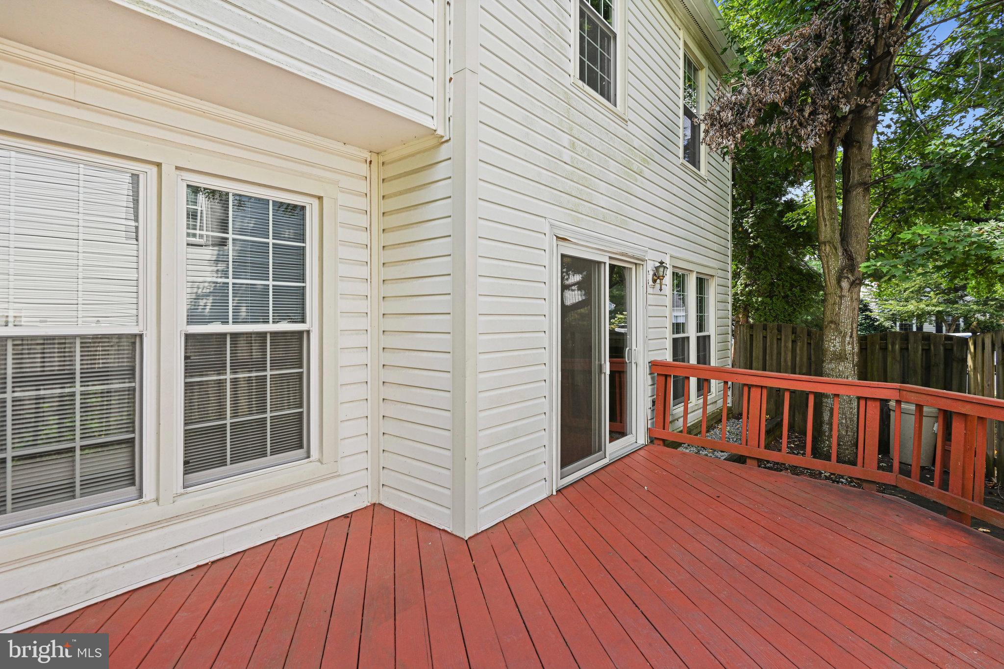 13345 Point Rider Lane Herndon, VA 20171 - Photo 40 of 43 a view of backyard with deck and wooden floor