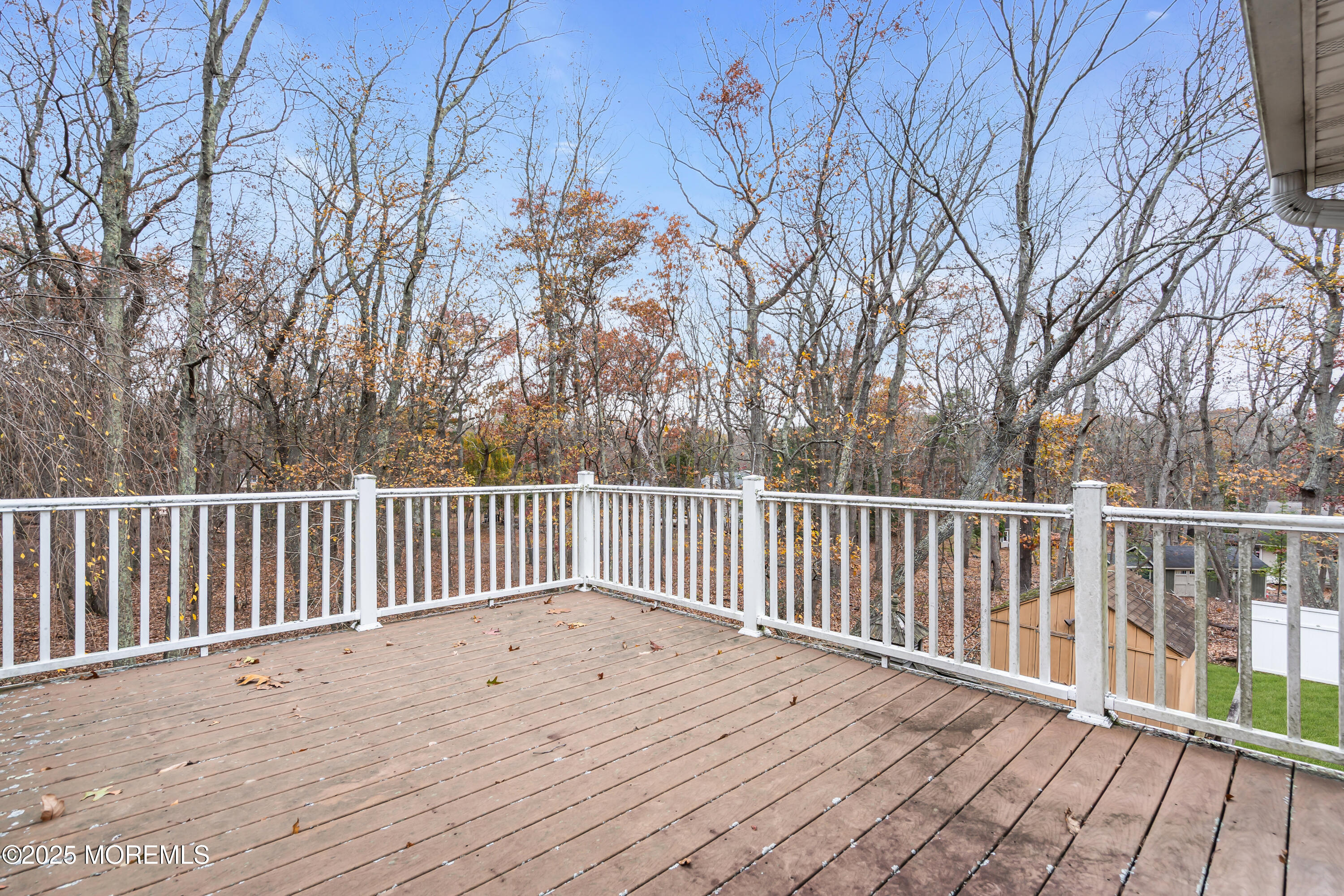 326 Jackson Pines Road Jackson, NJ 08527 - Photo 54 of 59 a view of balcony with wooden floor and fence