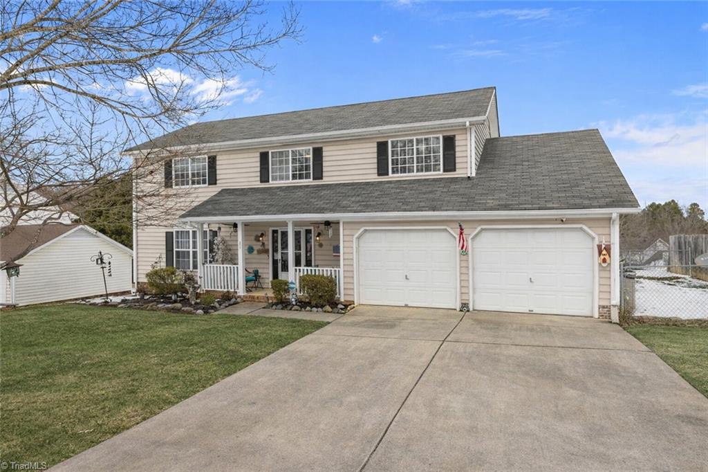 3913 Colony Ridge Court Jamestown, NC 27282 - Photo 3 of 43 Virtually adjusted Front photo of the house to show grass