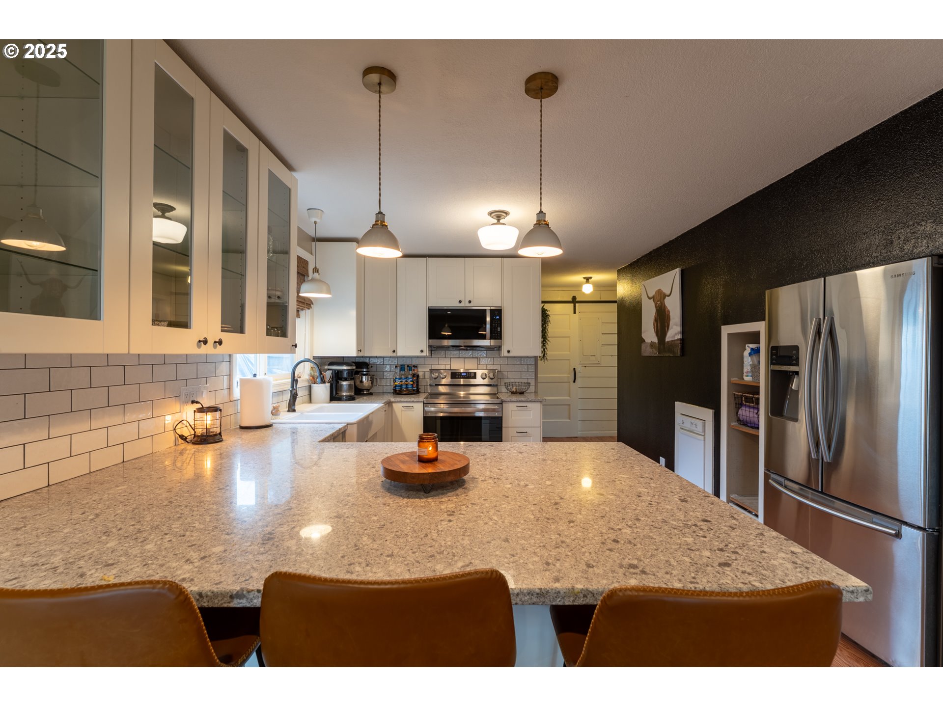 607 Getchell Avenue Amity, OR 97101 - Photo 11 of 33 a kitchen with stainless steel appliances granite countertop a sink refrigerator and microwave