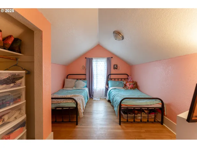 a bedroom with furniture and a bed