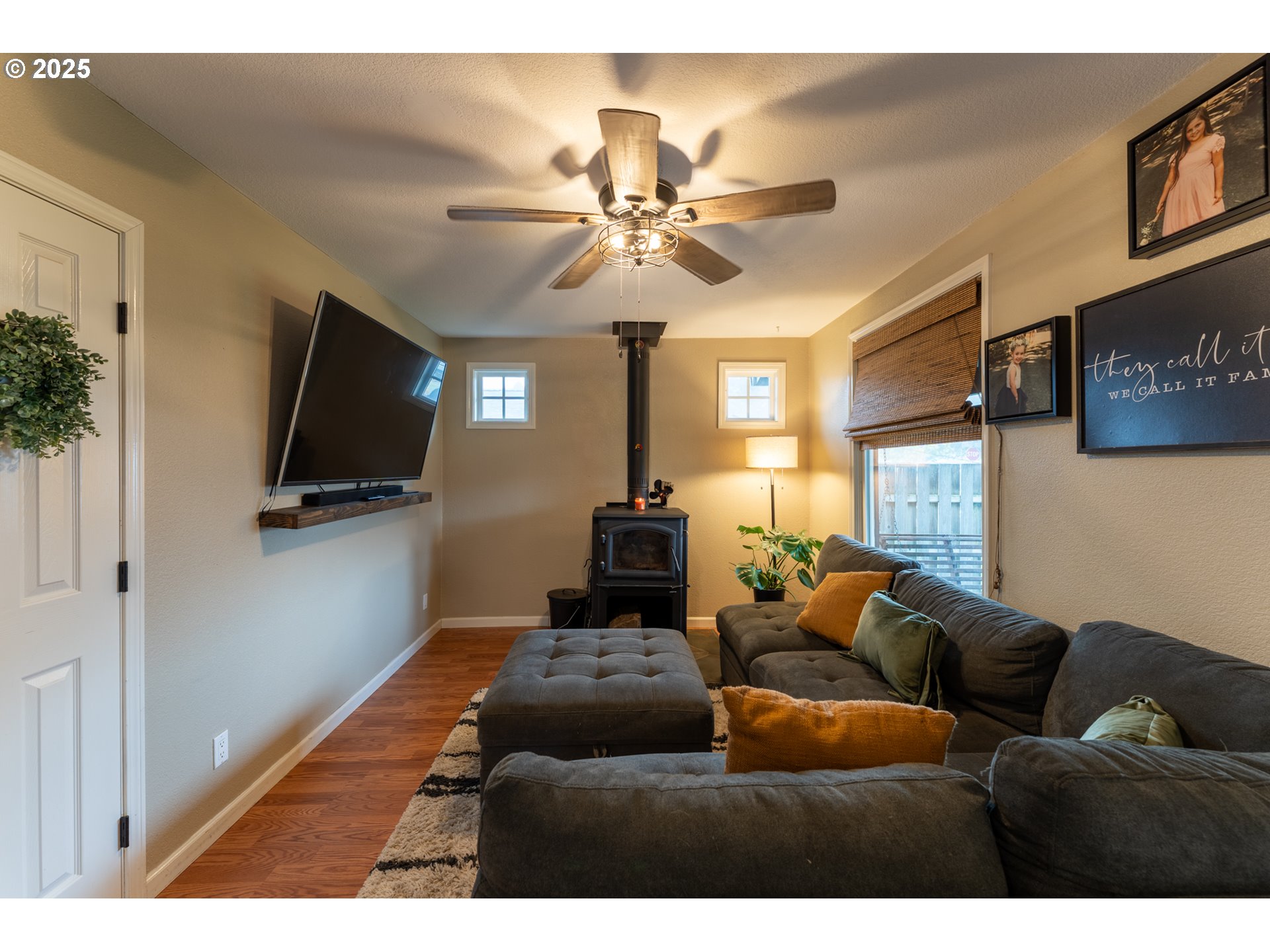607 Getchell Avenue Amity, OR 97101 - Photo 8 of 33 a living room with furniture and a flat screen tv