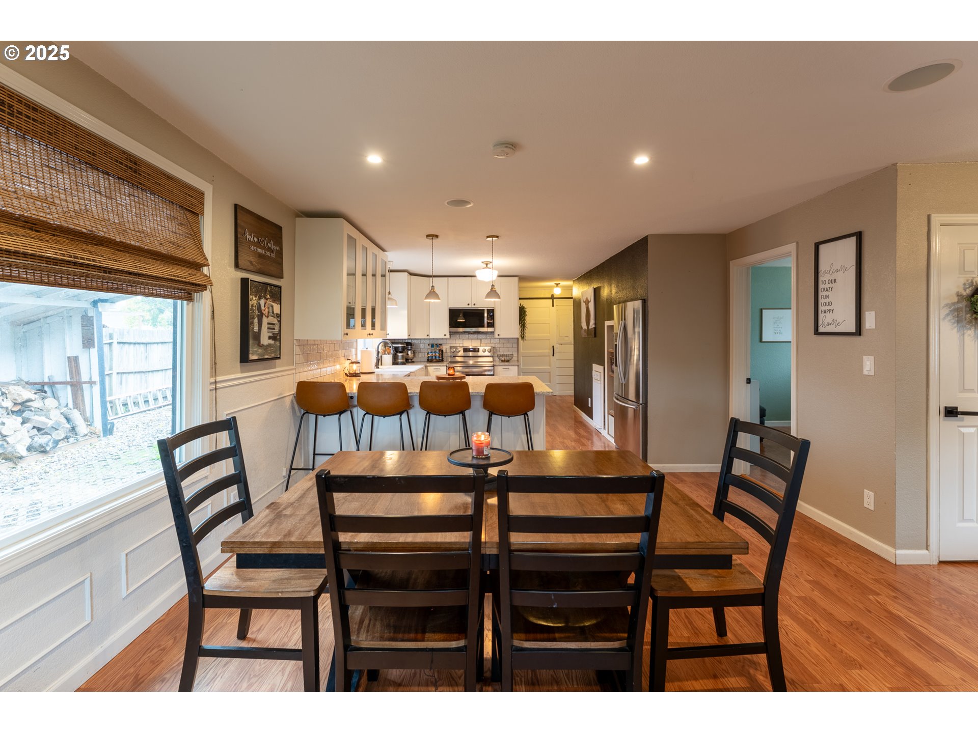 607 Getchell Avenue Amity, OR 97101 - Photo 9 of 33 a view of a dining room with furniture and wooden floor
