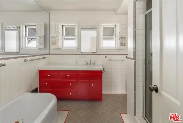 a bathroom with a sink and a bathtub