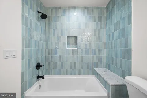 a bathroom with a sink and a bathtub