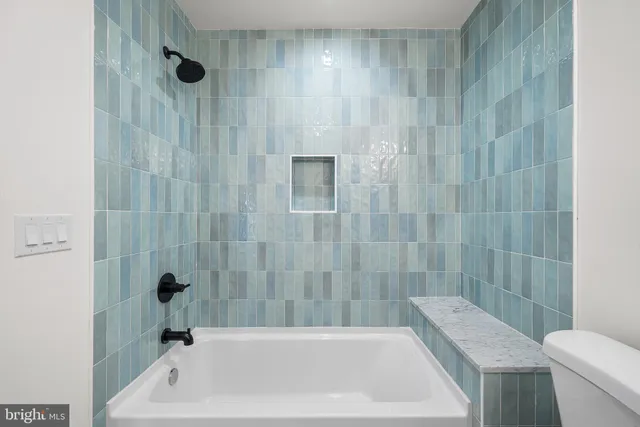 a bathroom with a sink and a bathtub