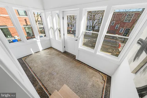a view of front door with furniture