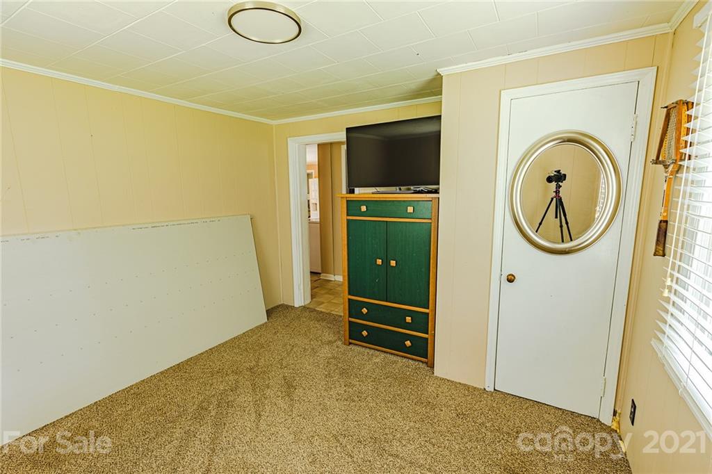 110 Edwards Road Mooresville, NC 28115 - Photo 2 of 39 a view of a livingroom with a washer and dryer