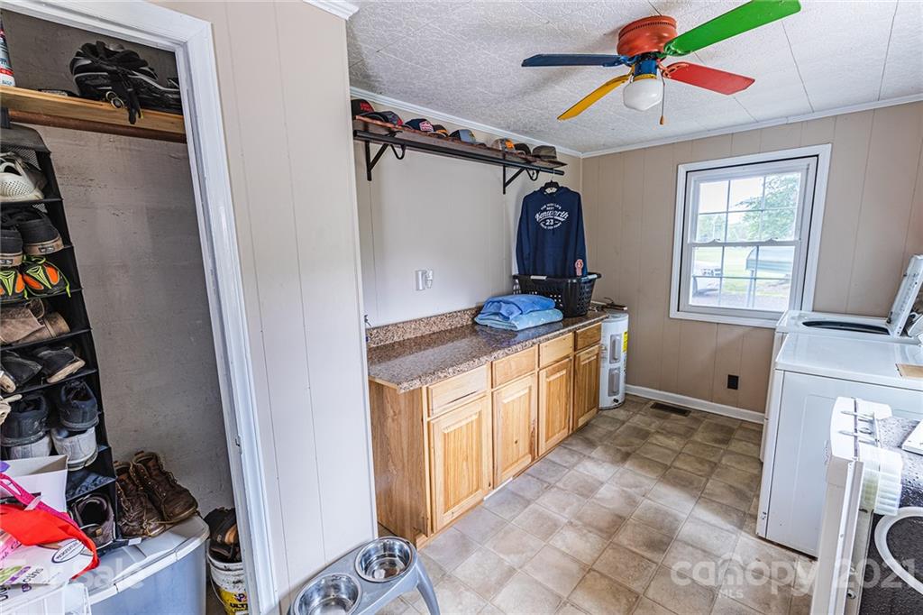 110 Edwards Road Mooresville, NC 28115 - Photo 15 of 39 a kitchen with a refrigerator and a sink